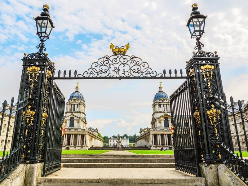 A picture of ornate gates painted in black and gold