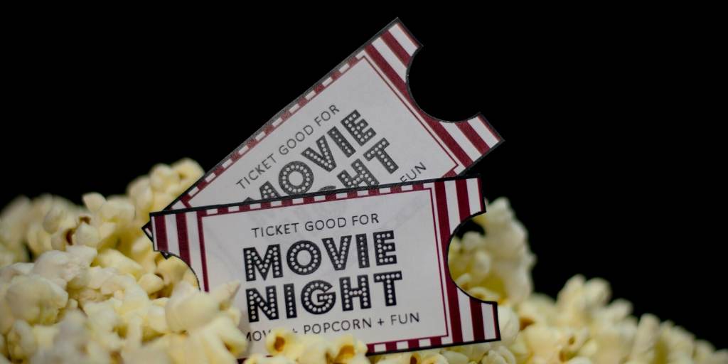 A picture of movie tickets and popcorn a great way to watch movies set in London