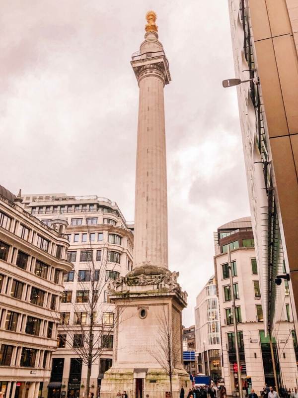 PUDDING LANE MONUMENT IN LONDON