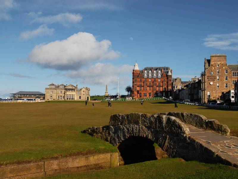 A golf course with a bridge in St Andrews a popular place to visit in Scotland