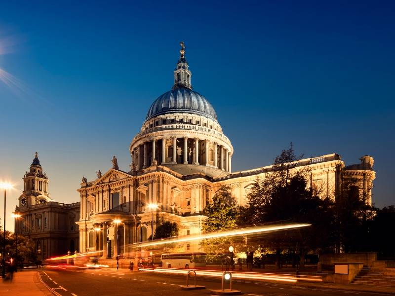 A picture of St Paul's Cathedral lit up at night one of the most famous landmarks in the UK