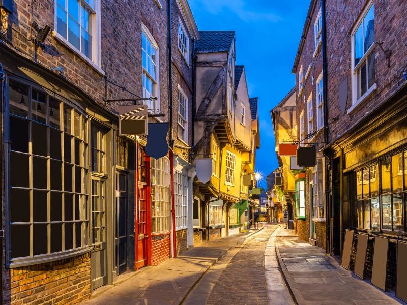 An old street in York England at night with cobblestones