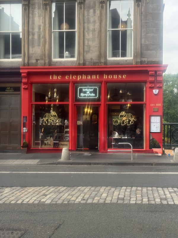 The red frontage of The Elephant House cafe on George IV Bridge in Edinburgh, open again after the 2021 fire