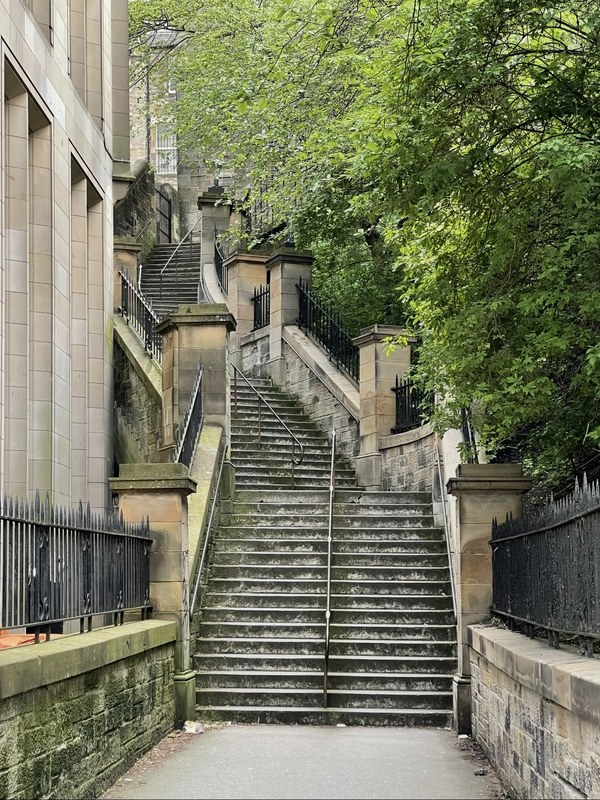 News Steps in Edinburgh, a wide stone stairway with landings and handrails on both sides