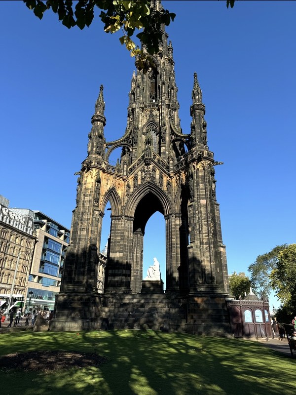The Scott Monument in Princes Street Gardens, Edinburgh, with the marble statue of Sir Walter Scott beneath the arch