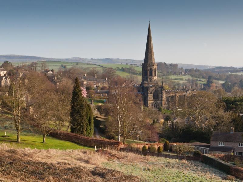 The town of Bakewell in winter with the hills of the dales in the bakground