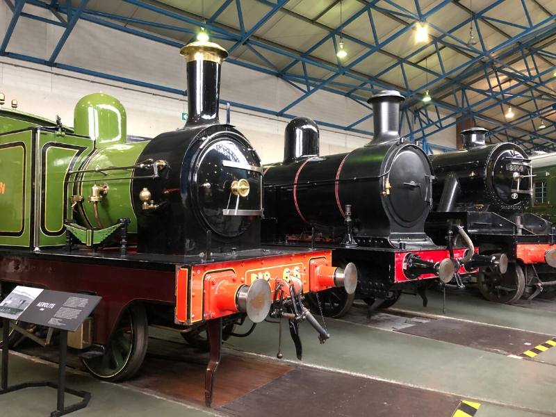 A row of old trains at the train museum in York England