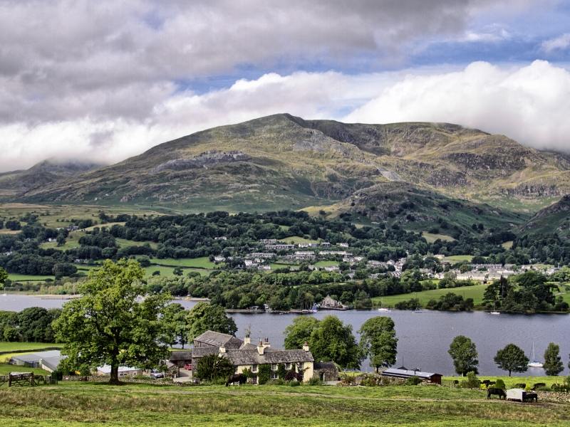 Coniston in the Lake District with stone houses and the lake