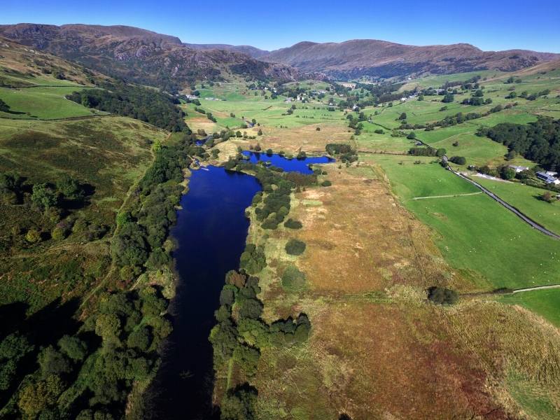 An aerial view of a lake in the Lake District