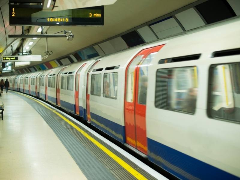 A Tube train in London pulling into a station