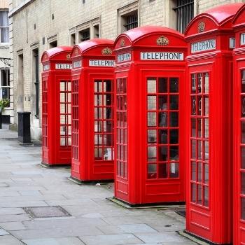 Red London phone boxes in a row