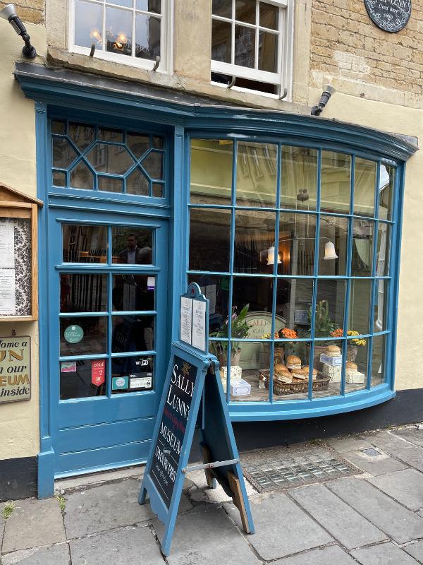 a store front with a sign