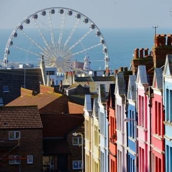 View of the Brighton wheel and colourful houses in England