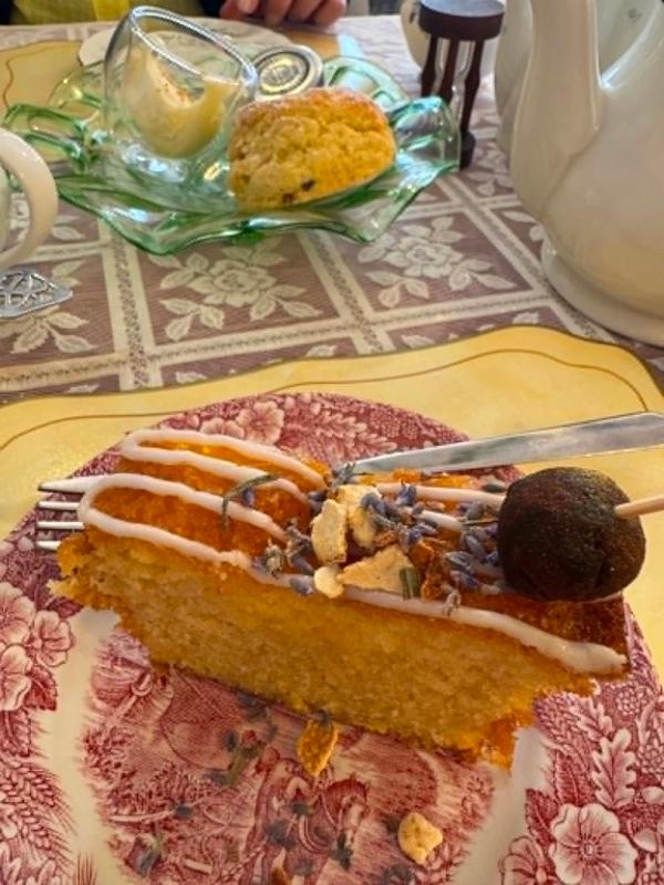 Lavender cake and a scone with cream at That Little Tea Shop in the Lanes, Brighton