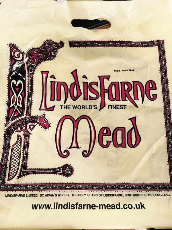 A bag with the words Lindisfarne Mead.