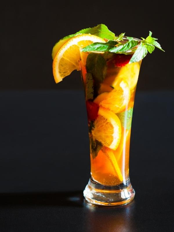 One of the most popular of English drinks a Pimms garnished with oranges and mint leaves.