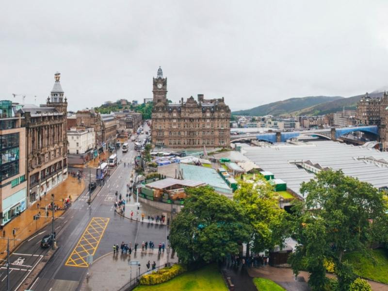 Princes Street in Edinburgh Scotland with pedestrians.