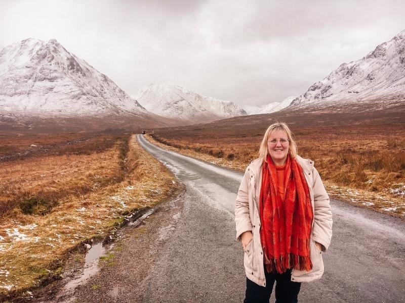 Glencoe in winter with rural roads and snow peaked mountains.