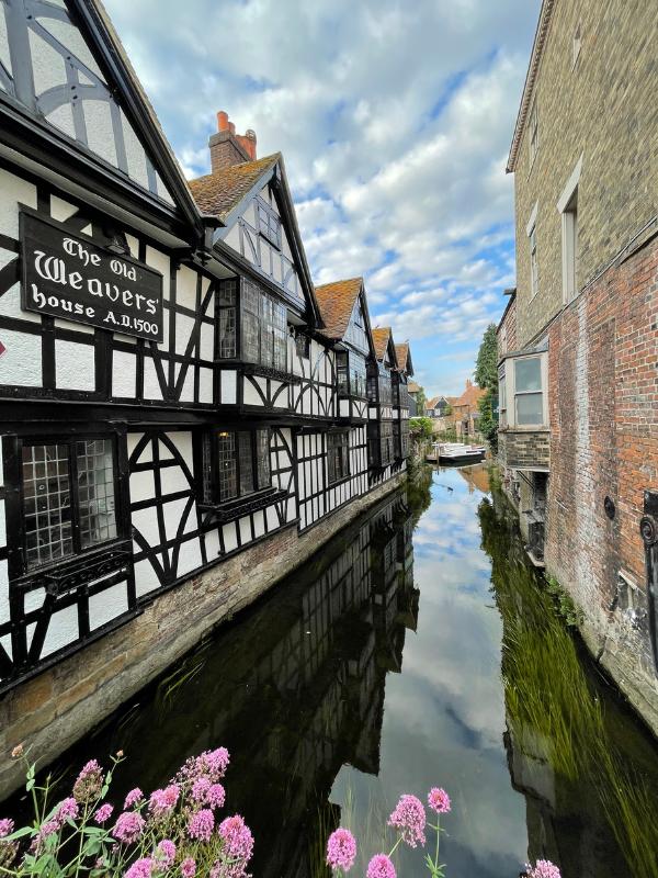 River in Canterbury with Tudor buildings overlooking.