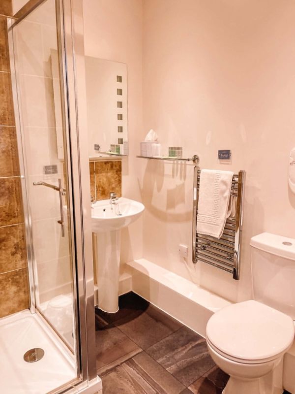 En suite bathroom with walk in shower at the Bar Convent, York