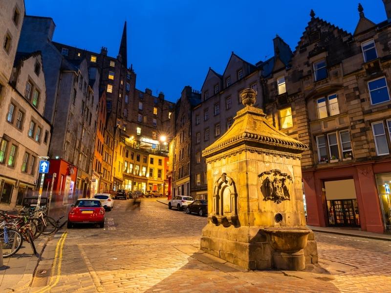 An image of Edinburgh's Grassmarket at night this is one of the best places to stay in Edinburgh.