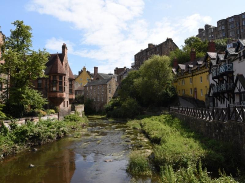 Houses overlooking a river in Stockbridge in Edinburgh