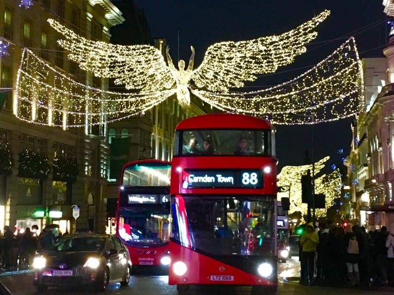 Image of London in winter with a London bus and Christmas lights.