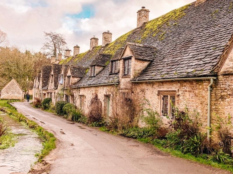 The beautiful village of Bibury is included in many Cotswolds tours from London.