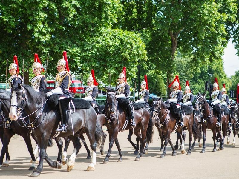 Changing of the Guard near Buckingham Palace in Westminster which is the best area to stay in London.