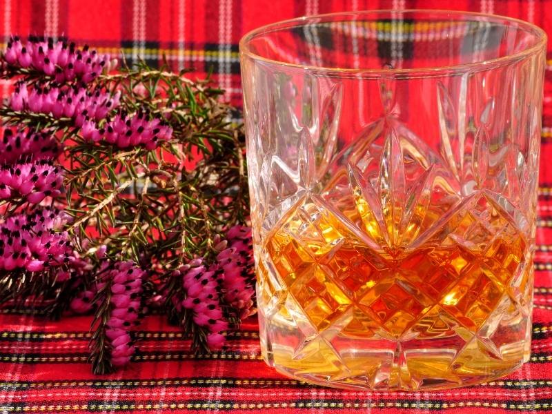 Famous Scottish drinks include whisky like in this image.