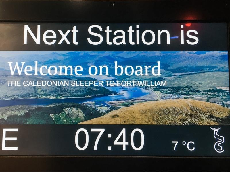 Caledonian Sleeper. sign for the next station.