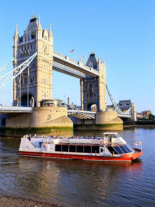 A great thing to do in London in spring is to take a boat trip along the Thames as in this photo of a boat passing Tower Bridge.