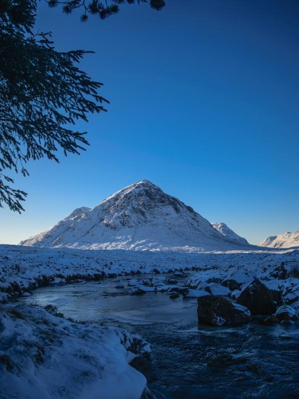 Fort William Travel Guide - Ben Nevis overlooking the Scottish Highland city.