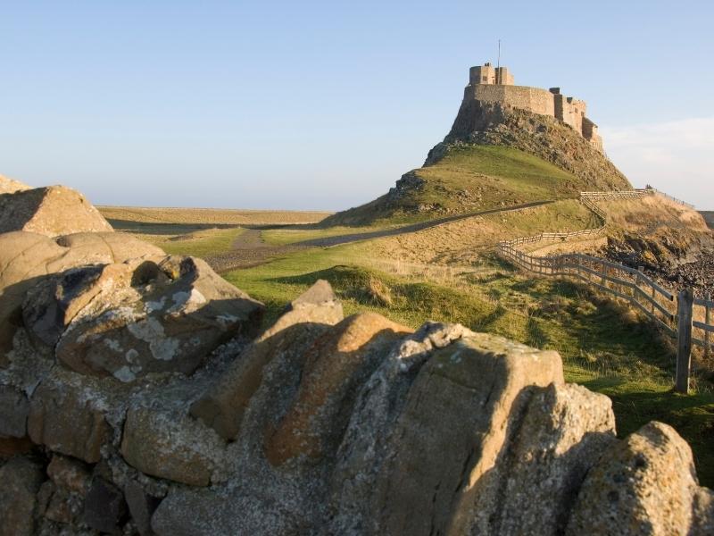 A photo showing Lindisfarne Castle   one of the top 10 places to visit in North East England