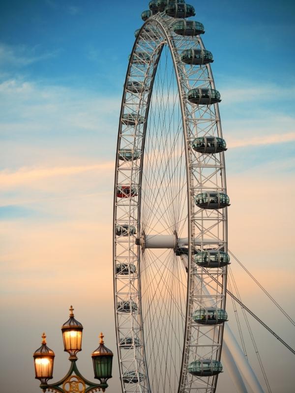 Visiting the London Eye is popular with tourists.