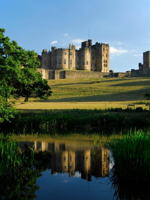 One of the most popular things to do in Alnwick is the visit Alnwick Castle shown in the image.