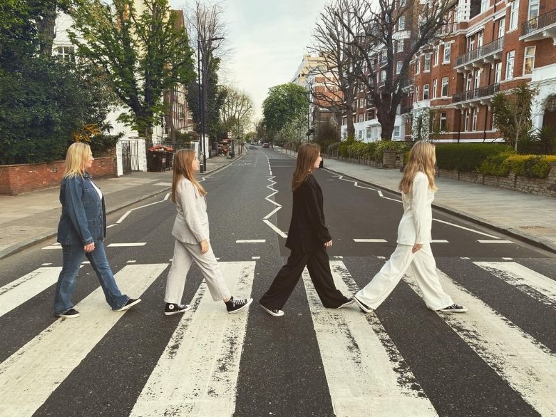 Cheryl's family recreate the famous Beatles Abbey Road shot - hear more in episode 13 of the UK Travel planning podcast.