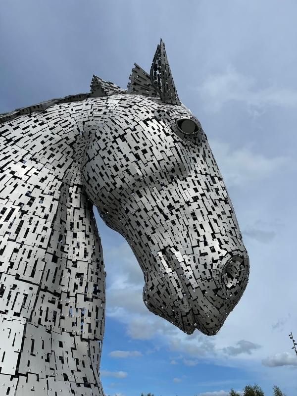 Episode 30 of the UK Travel Planning podcast talks about visiting the Kelpies during a Scottish road trip.