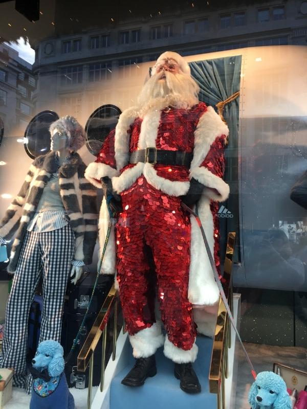 Santa in Harrod's Christmas windows in London.