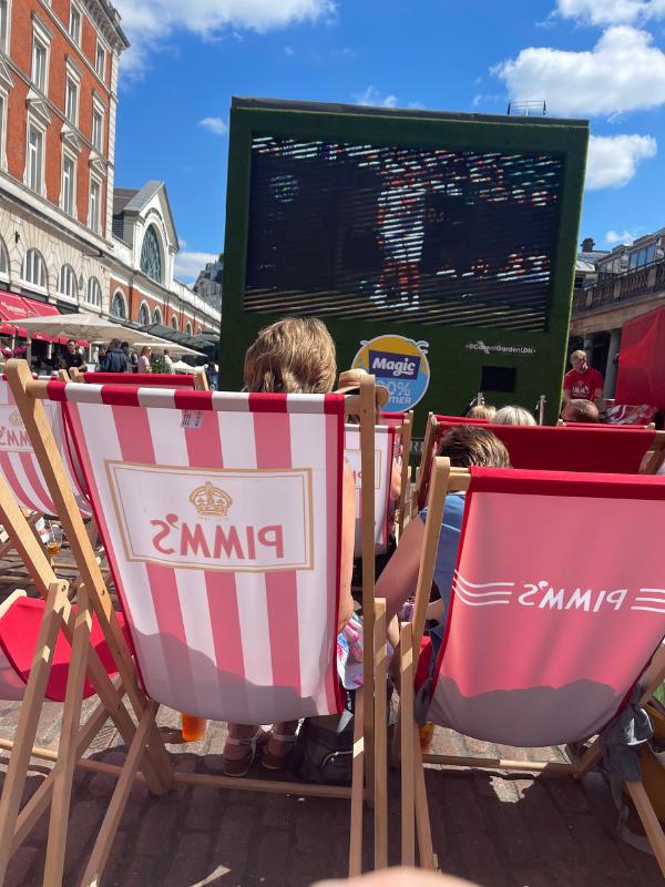Enjoying a Pimms watching the tennis at Covent Garden