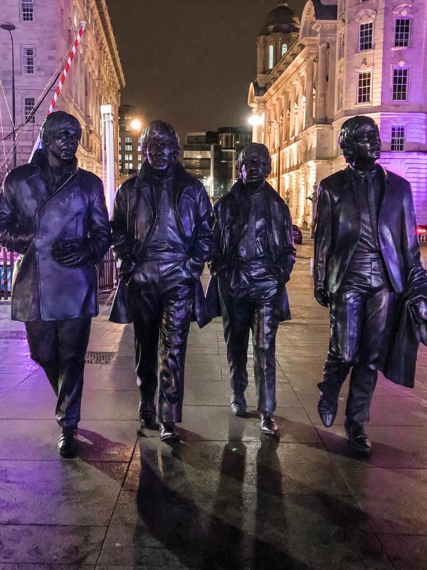 The Beatles in Liverpool Beatles statue at night