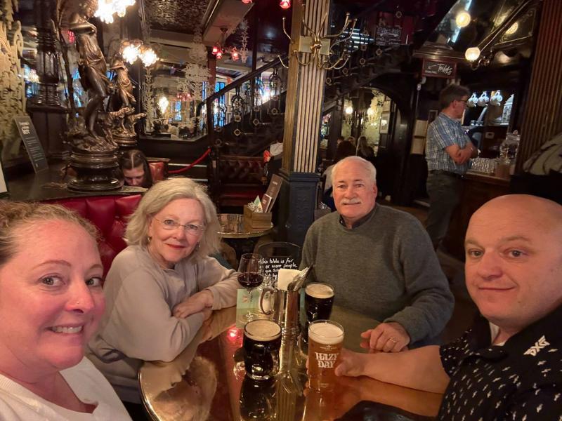 Kristens husband and Mum and Dad in a pub