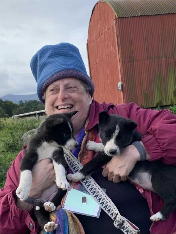 Laura Dilts and some puppies.