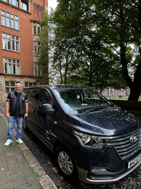 Belfast Travel Guide and cab driver.