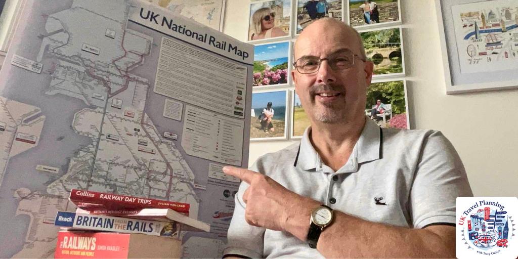 Man pointing at rail map.