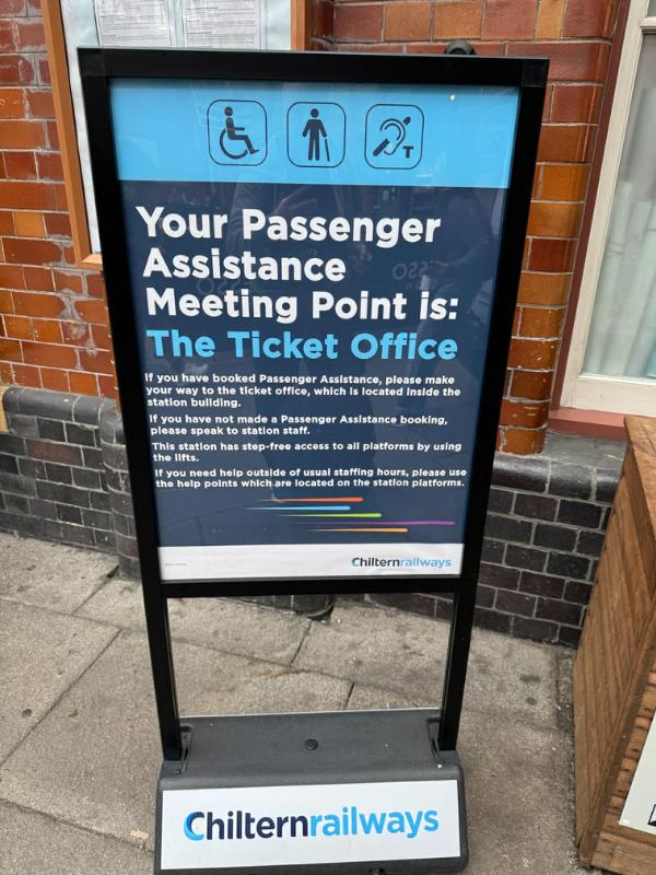 Chiltern Railways Passenger Assistance Meeting Point sign outside a UK train station showing accessibility services for wheelchair users, ambulant passengers and hearing impaired visitors