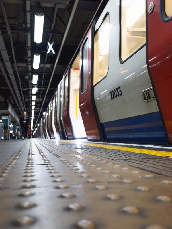 London Underground tube platform showing tactile paving strips — accessible travel planning for visitors to London