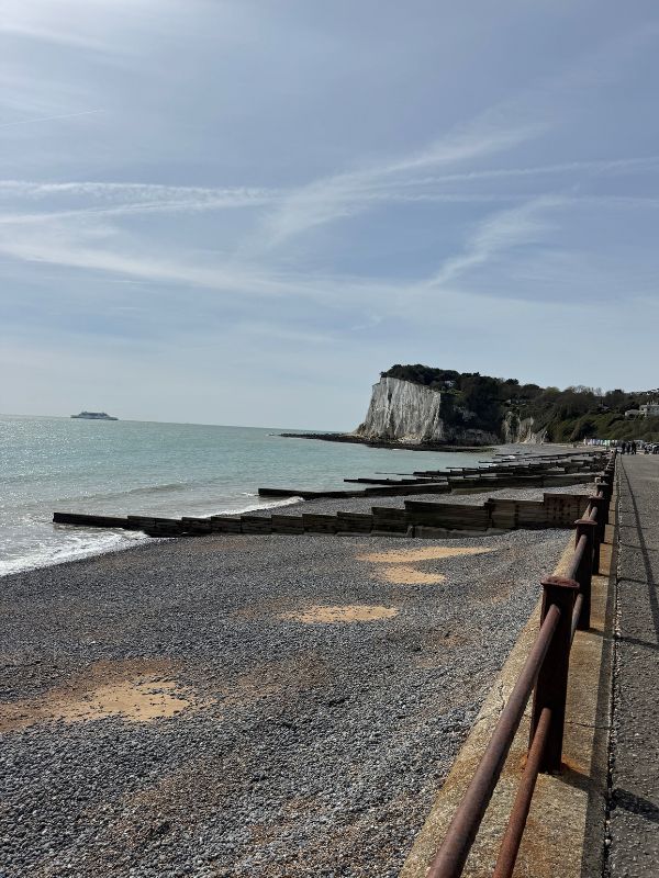 The White Cliffs of Dover viewed from the beach on an English Bus day tour from London
