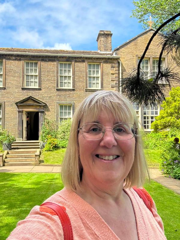 Tracy outside the Brontë Parsonage Museum in Haworth