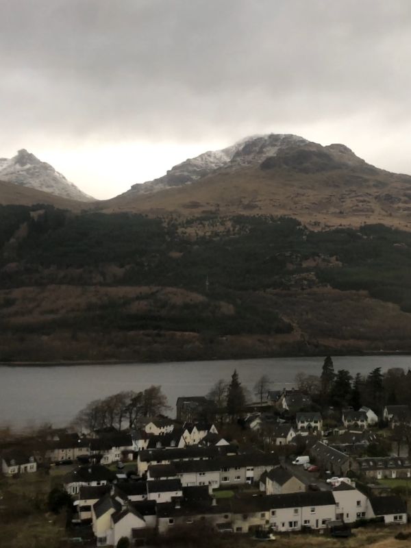 Arrochar and Tarbet station on the West Highland Line, with Loch Long and the Arrochar Alps beyond